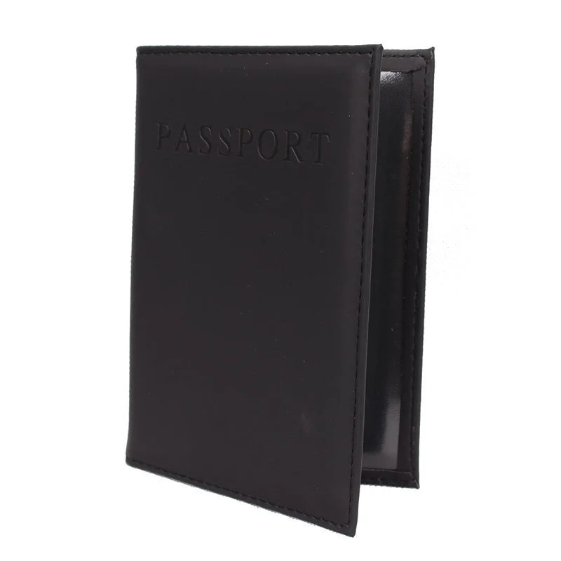 Black leather passport sleeve with debossed “PASSPORT” text on the cover