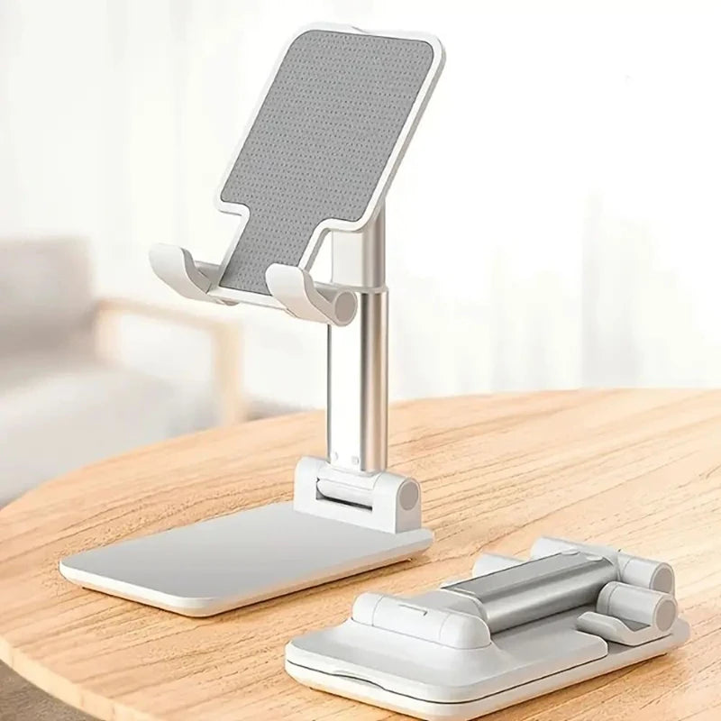 Foldable phone/tablet stand with textured dark back and adjustable metal support