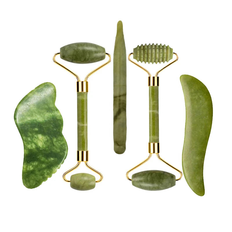 Nephrite jade massage set with roller, long wand, and gua sha tools in gold