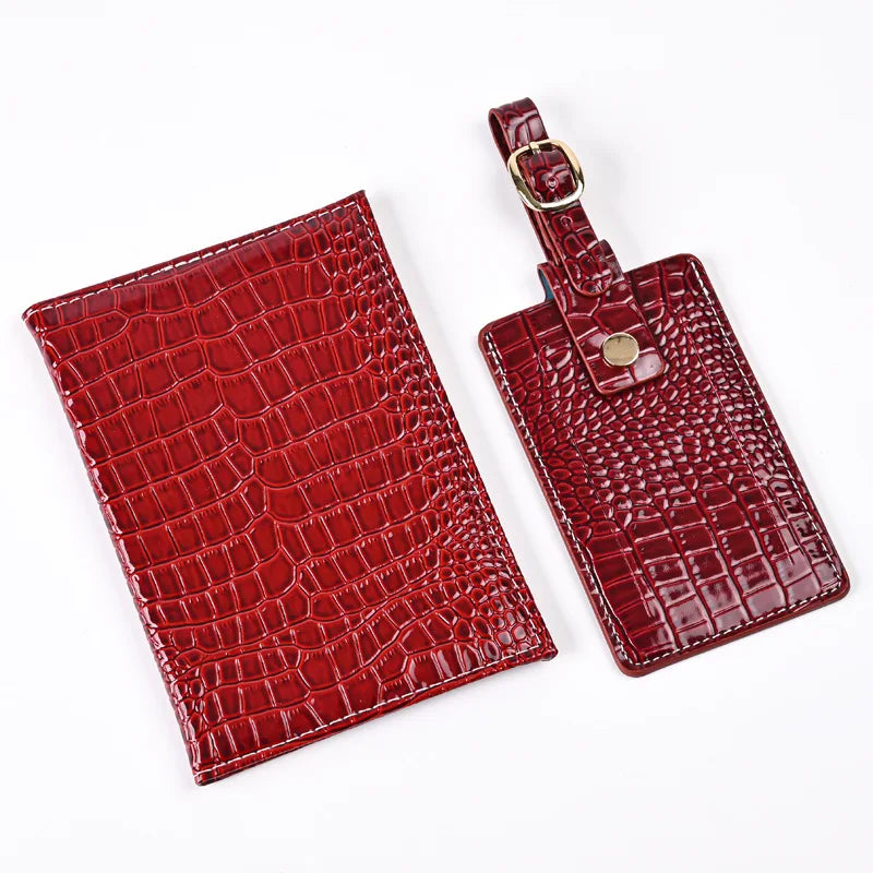 Burgundy vegan leather passport cover with croc texture and buckle strap holder