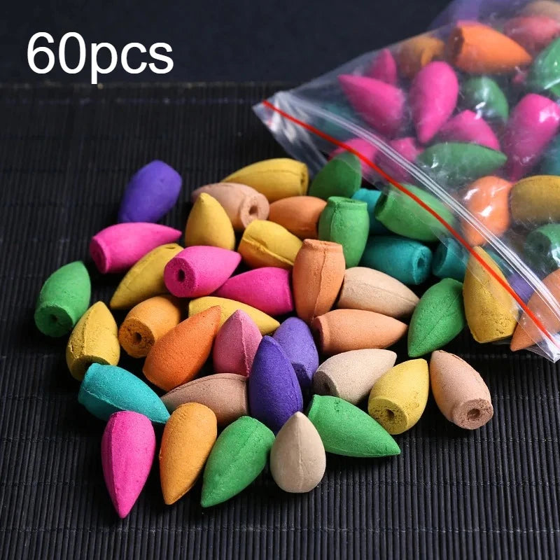 Mixed-color backflow incense cones with a clear bag, including purple, pink, and teal