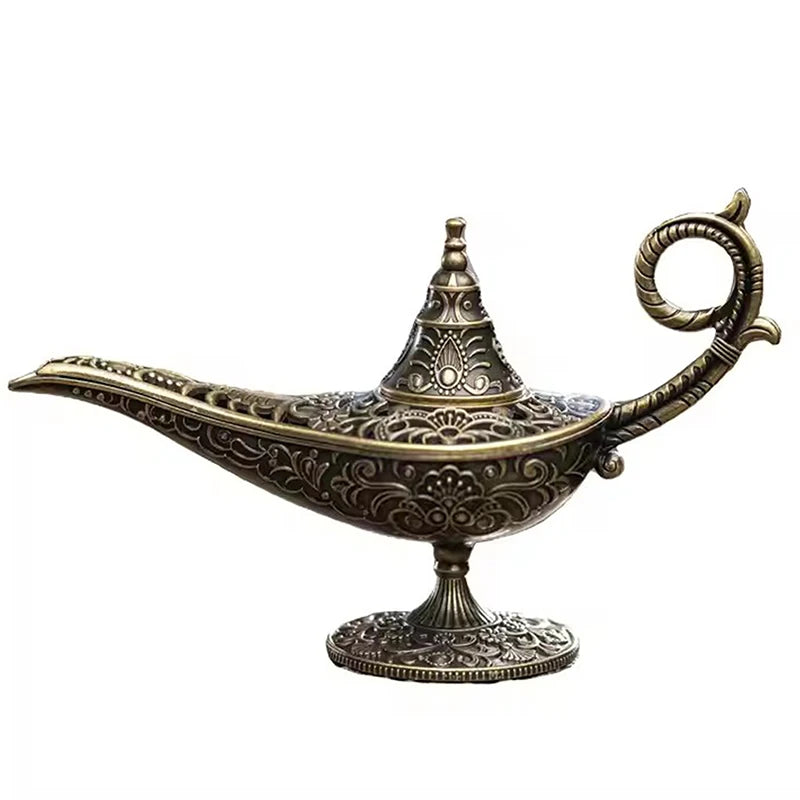 Antique lamp candle burner full view with carved base and curved ring handle