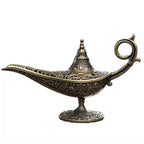 Antique lamp candle burner full view with carved base and curved ring handle