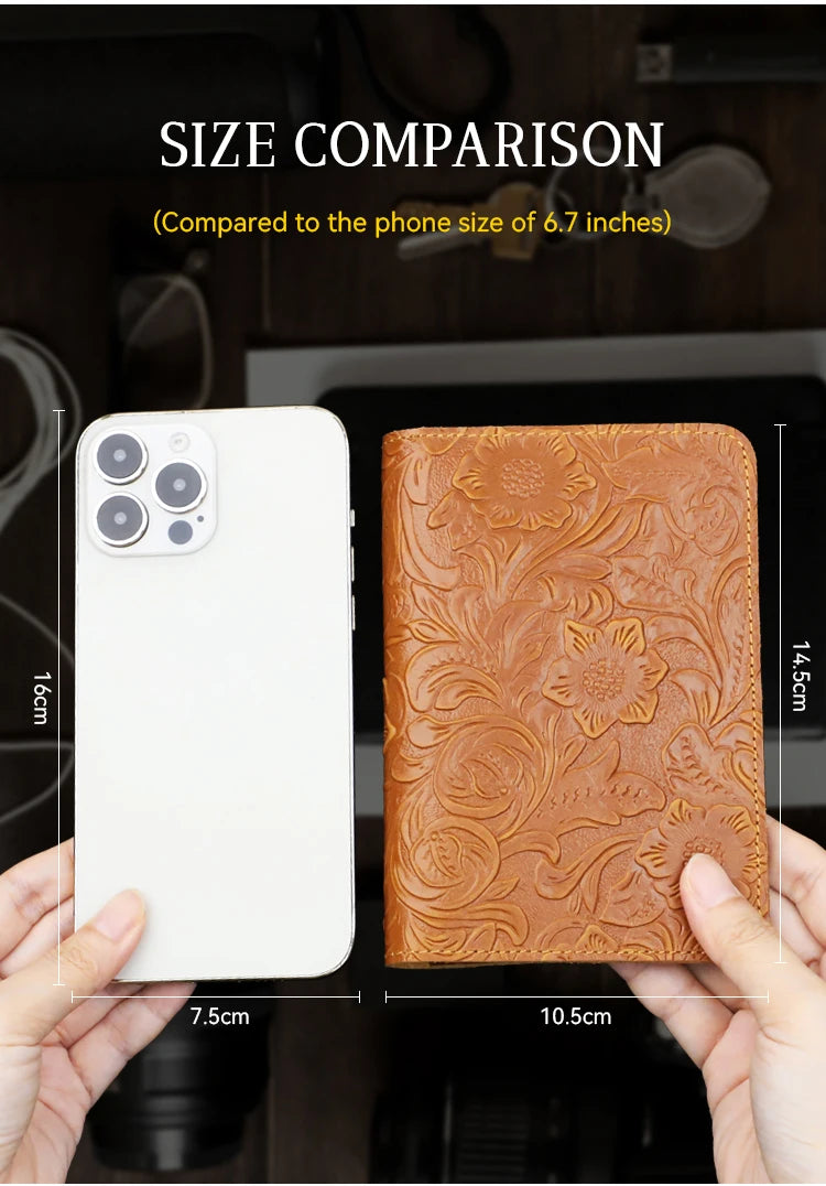 Cognac brown leather travel folio with embossed floral design, card slots visible.