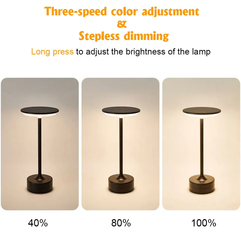 Cordless reading lamp showing three brightness levels; round dark shade and slim stem