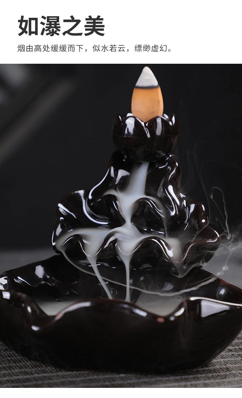 Glazed black backflow incense tower burner with cone incense and dense smoke plume