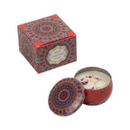 Vintage scented candle jar with red geometric pattern lid and white wax with petals