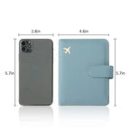 Passport cover size view: dark cover and light blue cover with airplane emblem and flap