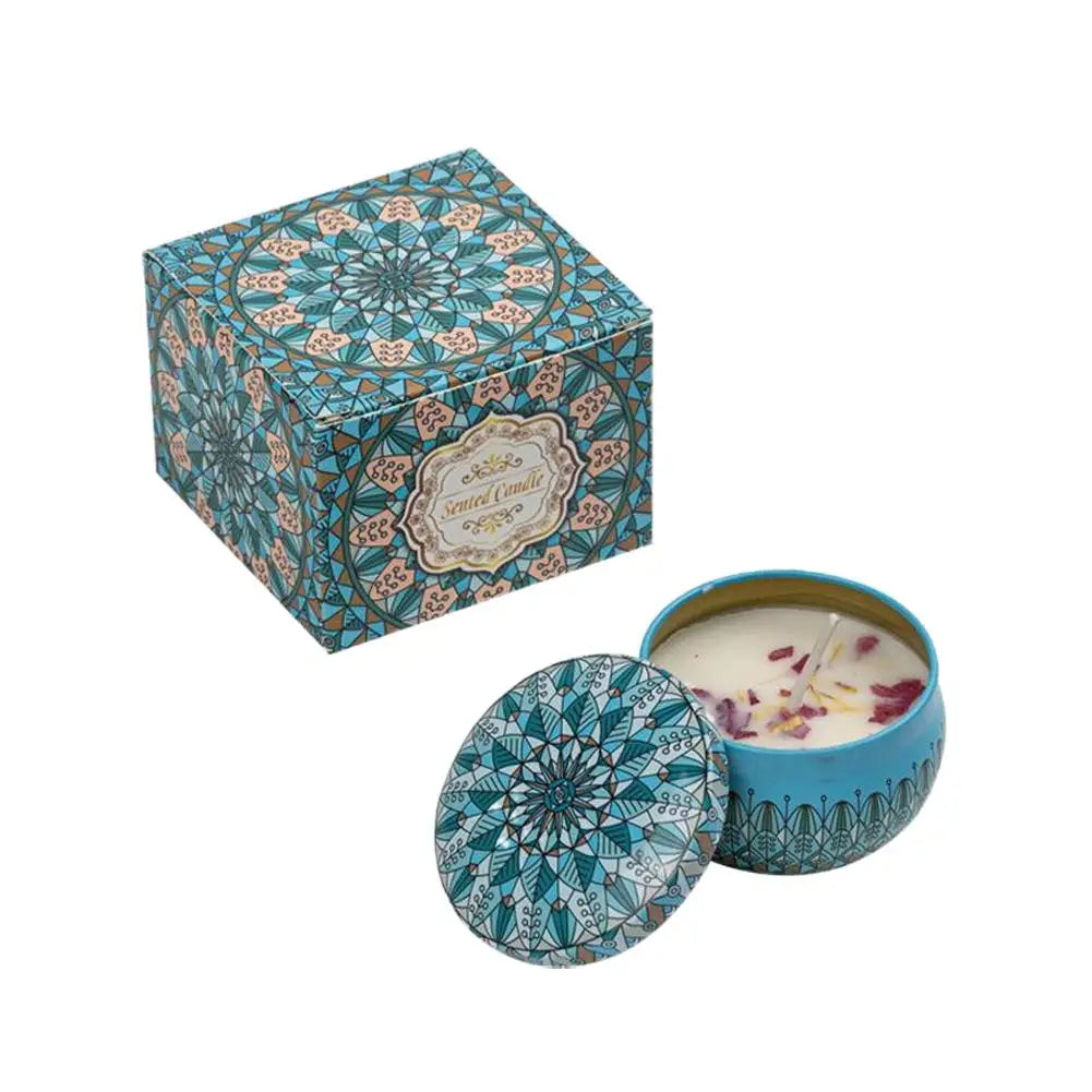 Vintage scented candle jar with blue teal mandala pattern lid and white wax with purple petals