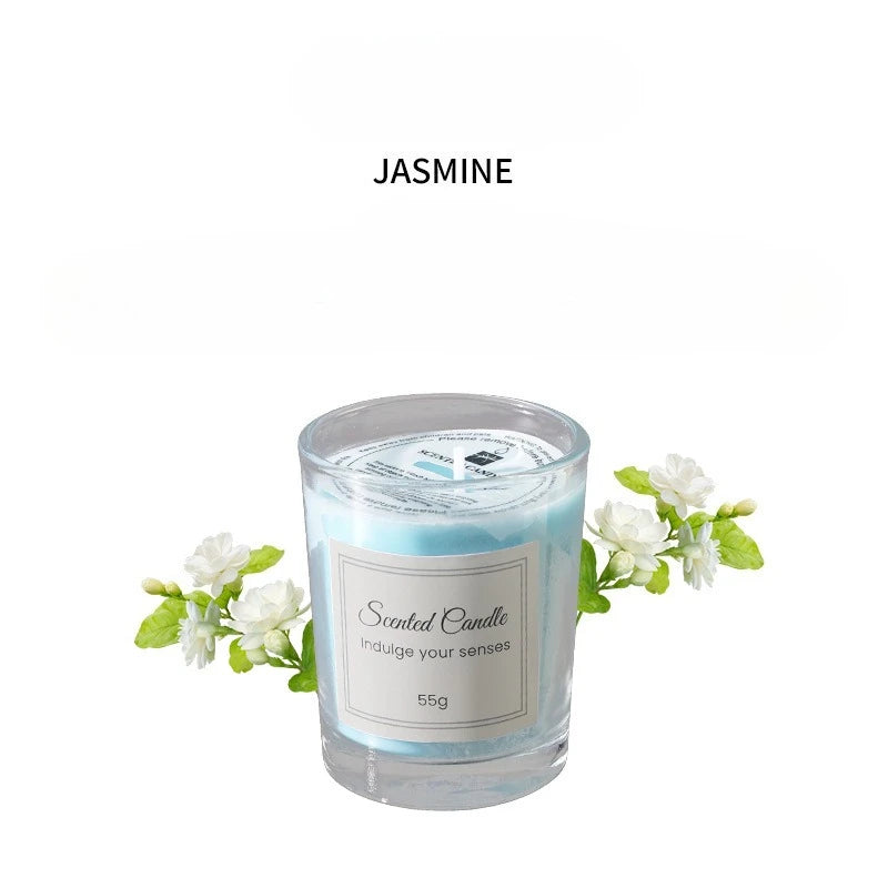 Jasmine scented candle in clear glass with white flowers, 55g label.