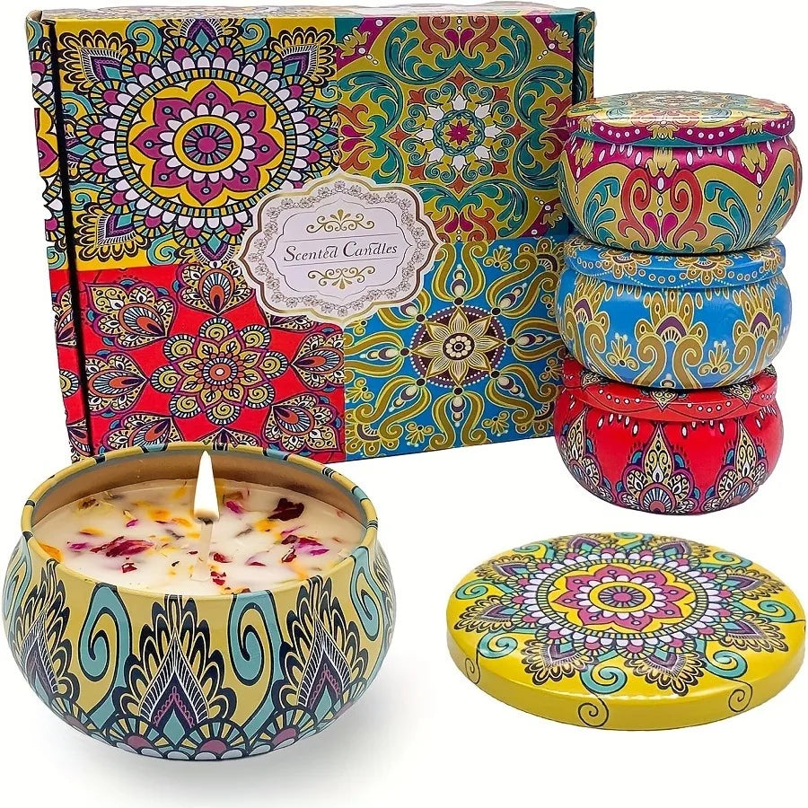 Relaxation scented candle set: colorful paisley tins with box and one lit candle
