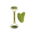 Jade roller with ribbed head and oval base, plus angled heart gua sha stone