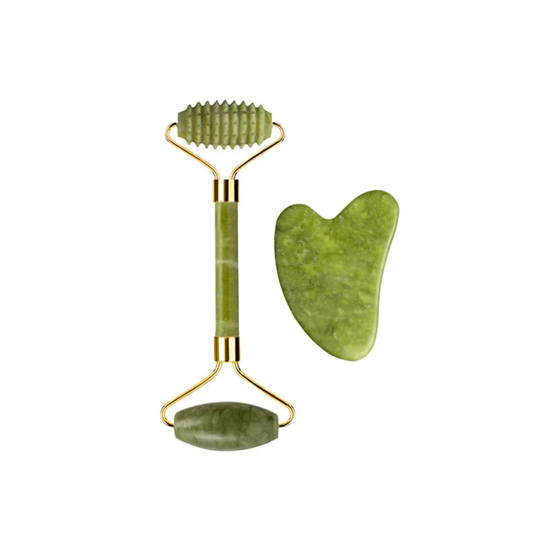 Jade roller with ribbed head and oval base, plus angled heart gua sha stone
