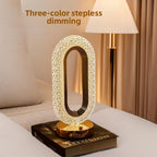 Pearl white crystal oval bedside lamp with gold base, step dimming