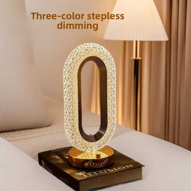 Pearl white crystal oval bedside lamp with gold base, step dimming