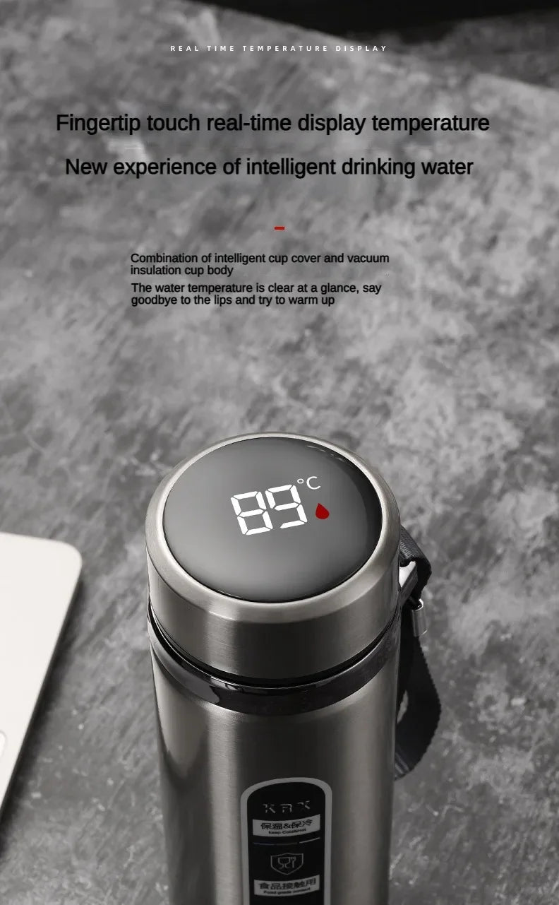 Silver LED thermos flask with touch display showing 88°C and carry handle strap