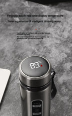 Silver LED thermos flask with touch display showing 88°C and carry handle strap