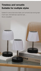 Cordless LED table lamps with pleated white shades, metal stems, and black bases