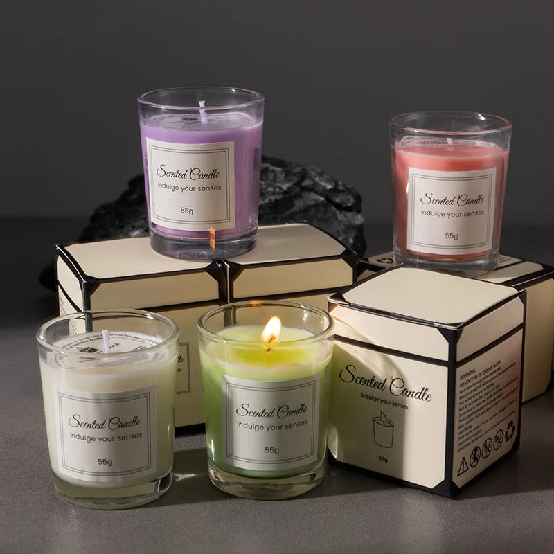 Signature scented candle gift box set with multiple glass candles and gift packaging.