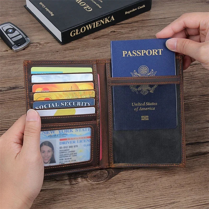 Compact travel document wallet opened, brown leather with passport sleeve and card pockets