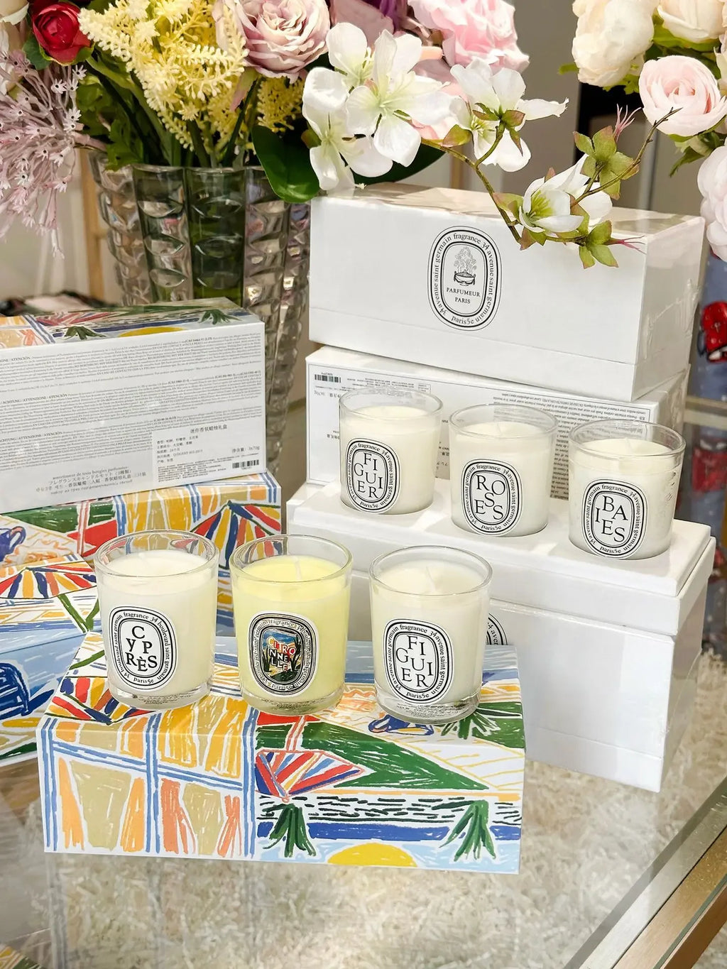 French Botanical scented candle jars in white and pale yellow, multiple fragrances
