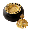 Ceramic oud burner with black dome base, ornate gold filigree lid and burner piece