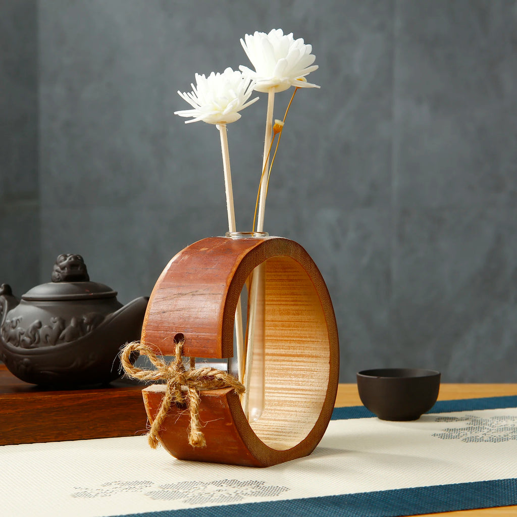Bamboo Glass reed diffuser bottle with side view of bamboo ring and clear glass cylinder