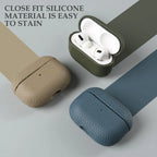 Leather AirPods cases in tan, green, and blue with textured pebble-grain finish