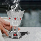 Brushed silver LED bakhoor censer with red gem panels and flame vent top