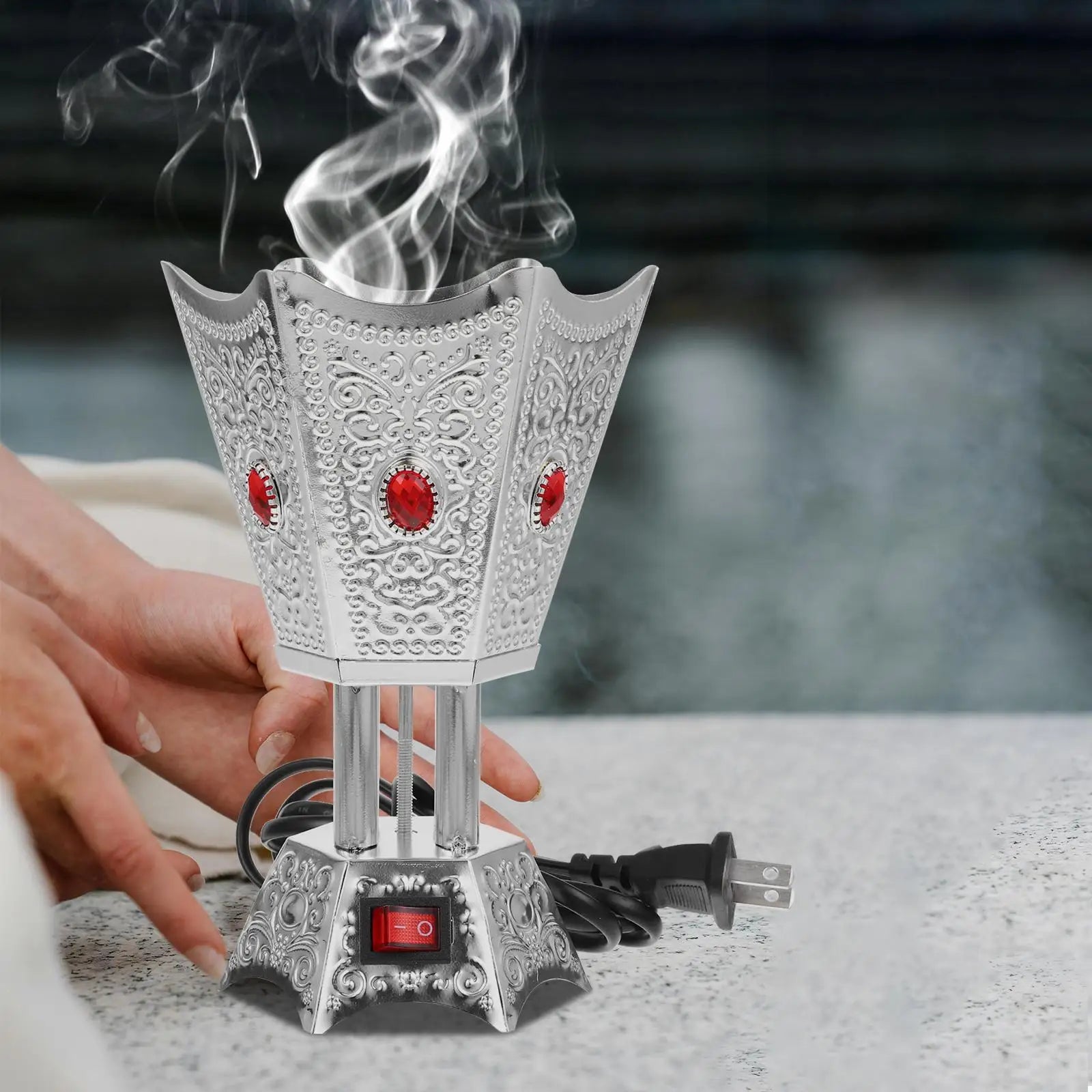 Brushed silver LED bakhoor censer with red gem panels and flame vent top