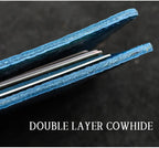 Blue leather folio with double-layer cowhide construction shown along the folded edge.