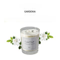 Signature scented candle in glass jar, Gardenia scent, 55g label on front.