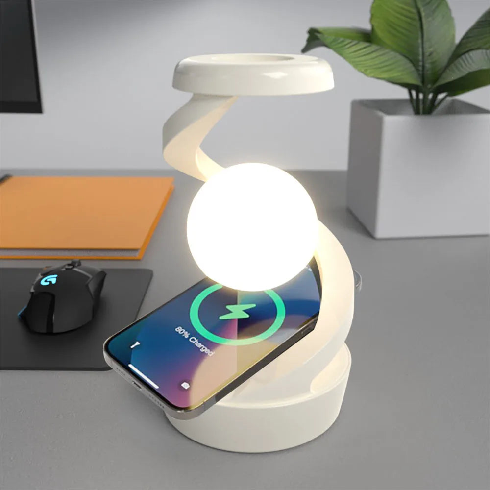 White wireless charging atmosphere lamp with phone charging indicator on the pad.