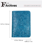 Midnight Blue leather travel folio with embossed floral pattern on front cover