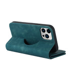 Teal MagSafe kickstand wallet with camera cutout and foldover viewing stand