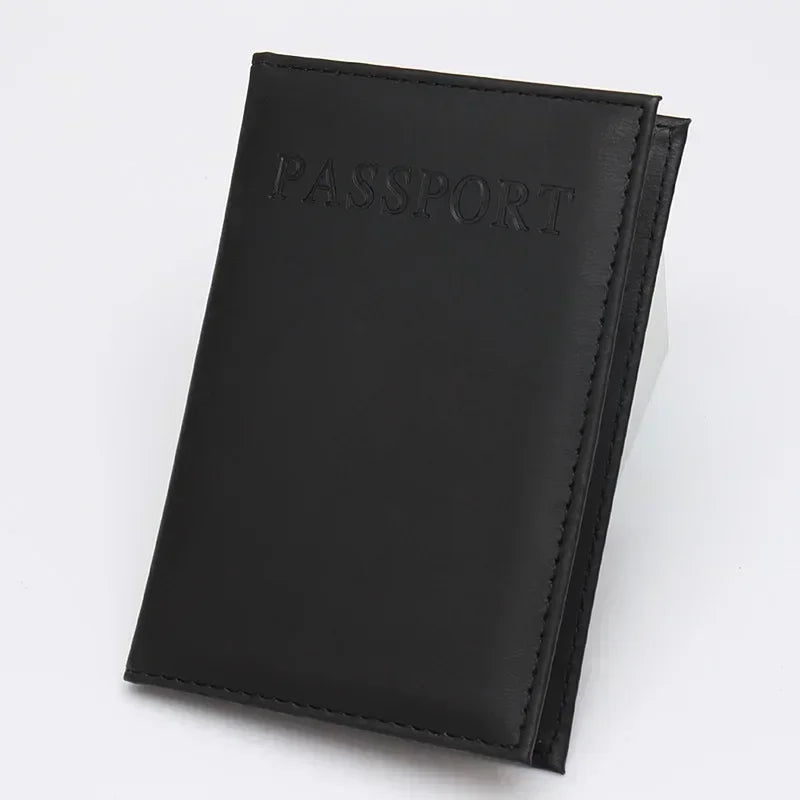 Onyx black classic travel passport sleeve with “PASSPORT” lettering