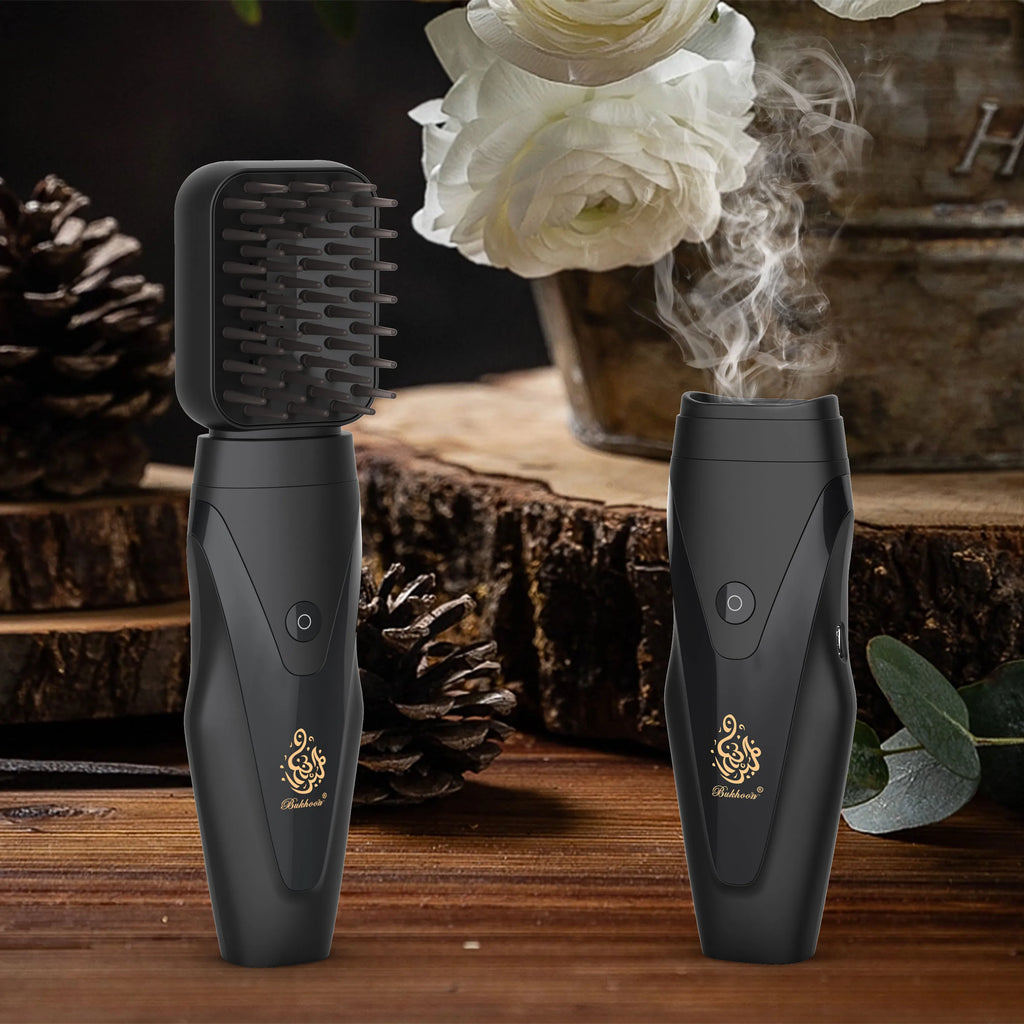 Black electric hair bakhoor diffuser with comb-style heat plate, producing visible vapor