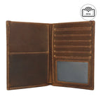 Cognac brown travel wallet interior with multiple card slots and a clear ID window.