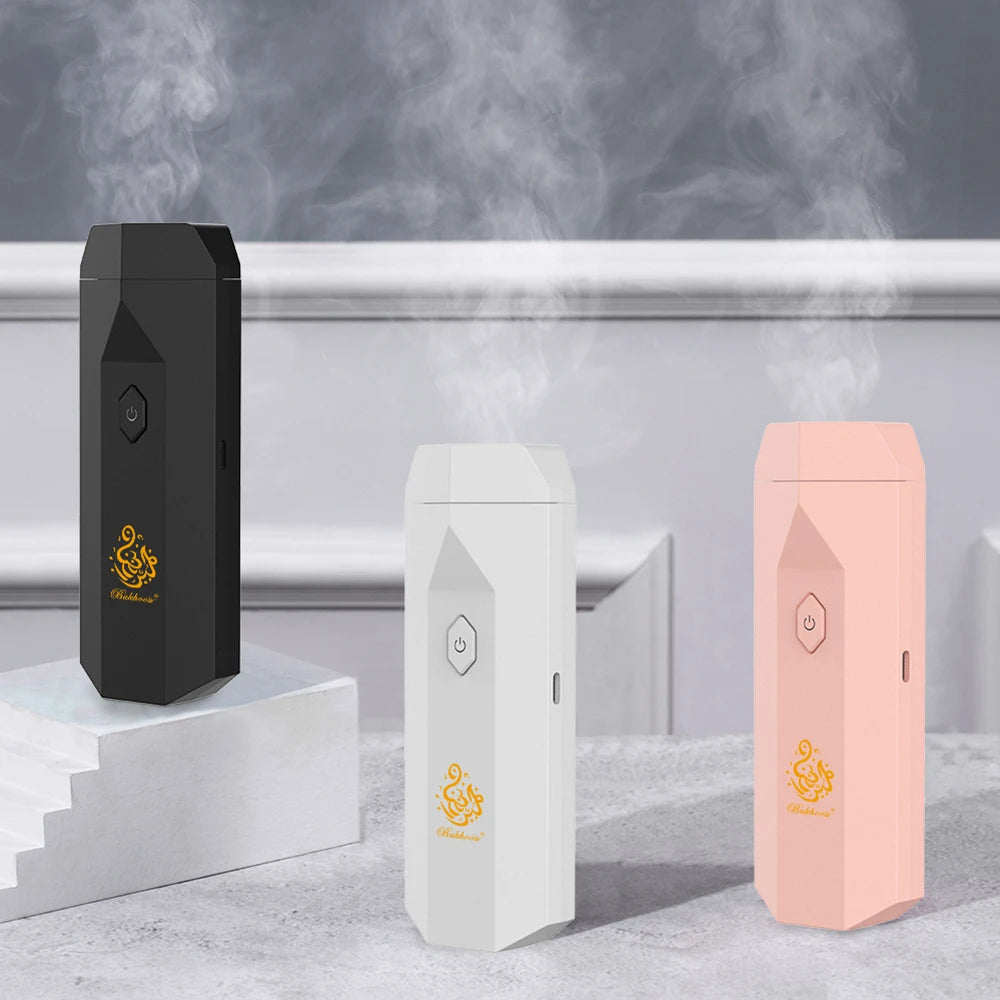 USB aromatherapy burner set with matte black, white, and light pink bodies and power icons.