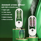 White aroma diffuser with night-light effect, illuminated chamber, and digital display