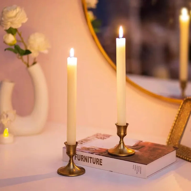 Bronze metal tabletop candle holder with wide round base and fluted stem