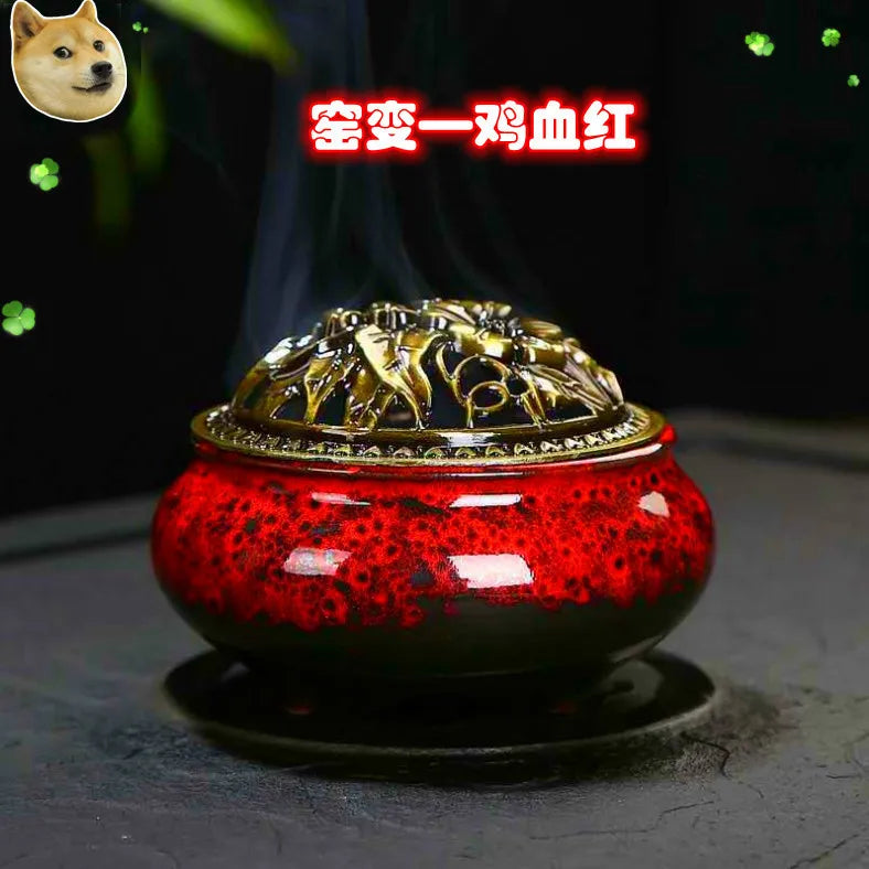 Ceramic incense burner with red speckled glaze and bronze dome lid