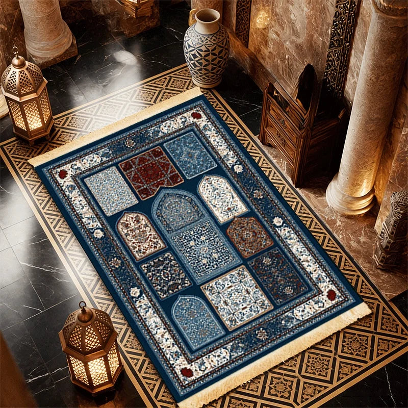 Blue geometric prayer mat with border and light fringed edge, patterned blocks