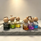 Glass car perfume diffuser: multi-color bottles with round wooden caps on cords