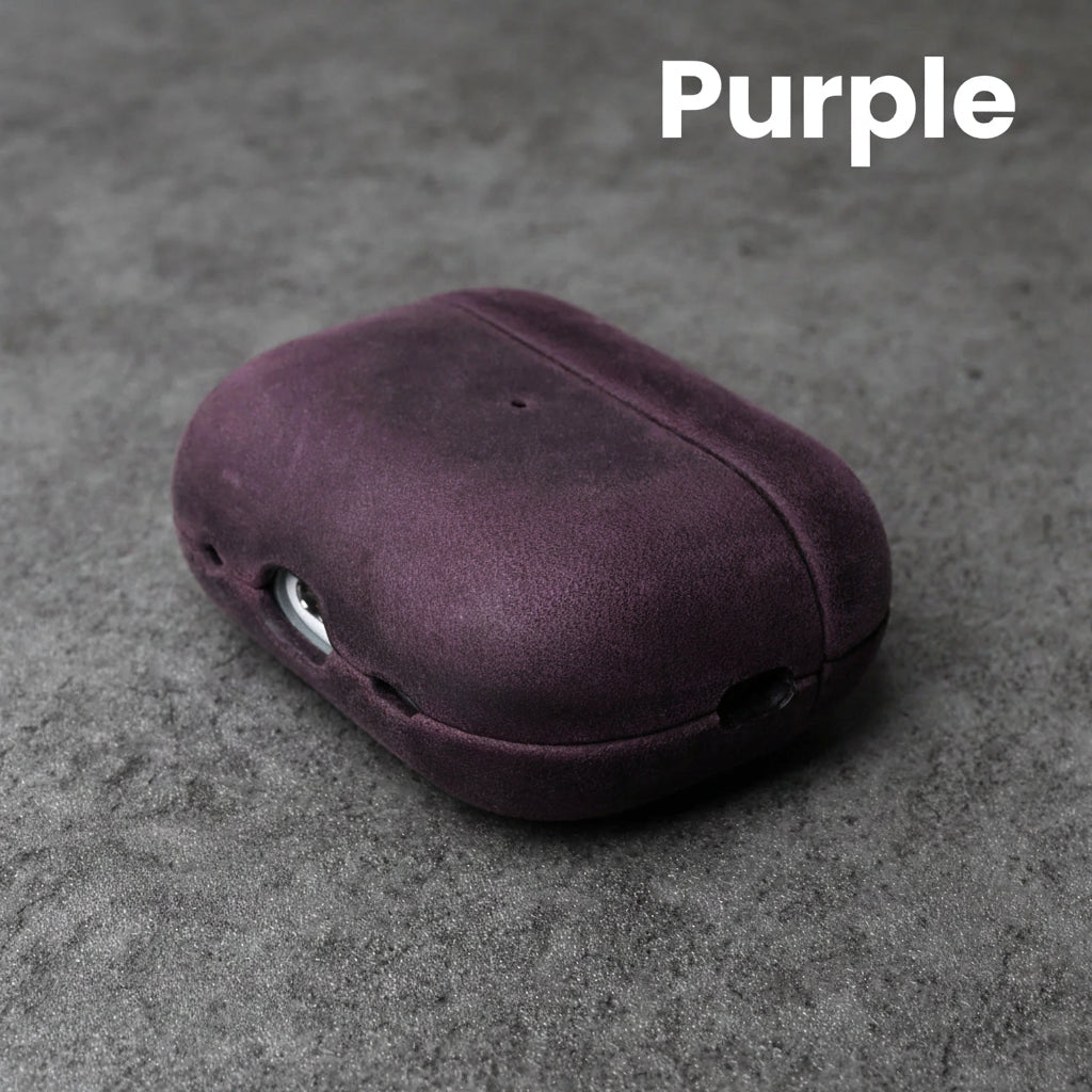 Purple leather AirPods case with front cutouts and smooth rounded shell
