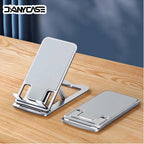 Metal foldable phone stand with adjustable angle, silver frame and wide support base