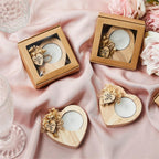 Wedding favor scented candles in heart-shaped wooden holders, in gift boxes