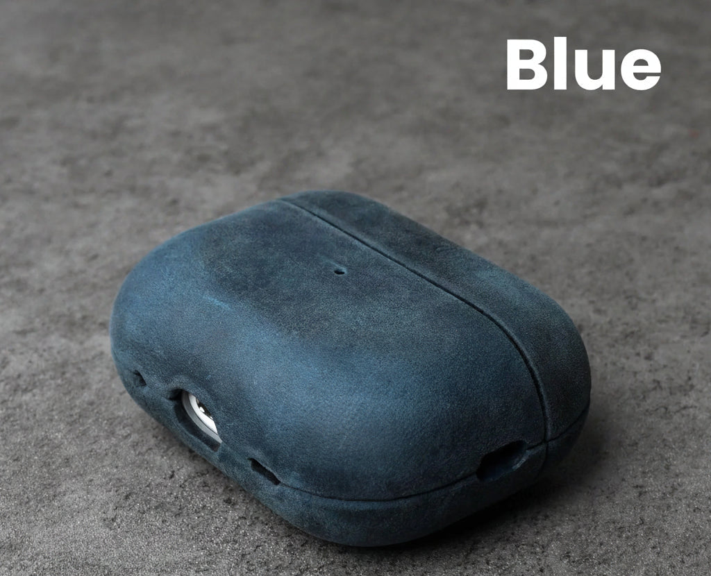 Blue leather AirPods case with front cutouts and smooth rounded shell