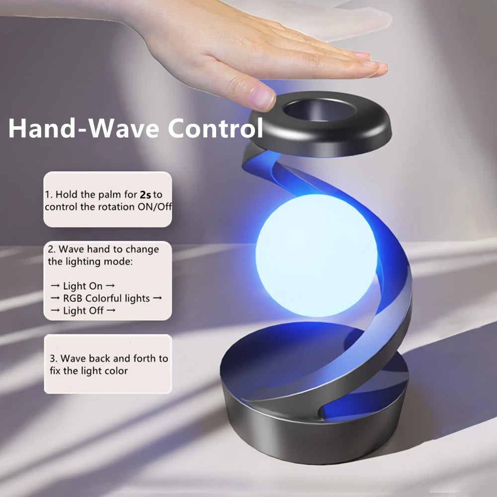Hand-wave control floating wireless lamp, blue glowing orb on dark gray base