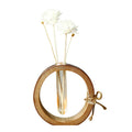 Bamboo Glass reed diffuser bottle close-up with bamboo ring, twine bow, clear glass and white reeds